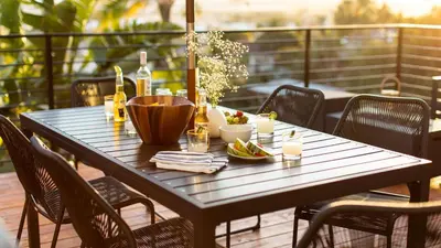 a wooden table on a deck with bottles and food on it at Avalon 2 Unit Buyout I III AvantStay Mins to GaslampBeautiful Deck w BBQ in San Diego