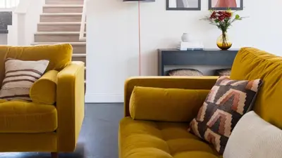 a yellow couch and two chairs in a living room at Balboa I by AvantStay - Stylish Condo Balboa Park Adjacent w Views in San Diego