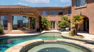 a swimming pool in front of a house at Sangiovese By AvantStay Spectacular Estate w Pool Hot Tub Putting Green in Temecula