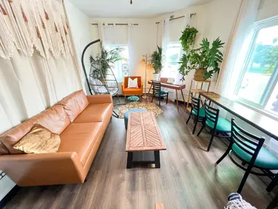 a living room with a couch and a table at ITH San Diego Mission Beach Backpacker Hostel in San Diego