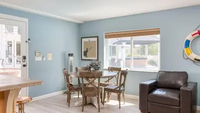 a dining room with a table and chairs at Grand Contento by AvantStay Extraordinary Estate w Pool Movie Room in Temecula