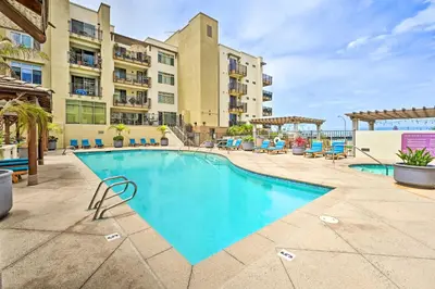 an image of a swimming pool at a hotel at Breezy Oceanside Condo Less Than half Mi to Beach! in Oceanside