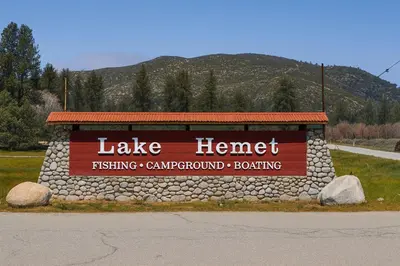 a sign for a lake henrett fishing campground bombing at Wildflower Haven room in Hemet