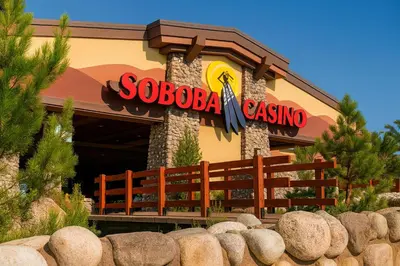 a building with a sign for a restaurant at Wildflower Haven room in Hemet