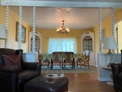 a dining room with a table and chairs at House on Organic Farm in Escondido