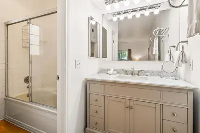 a bathroom with a sink and a shower at Life on the Point in San Diego