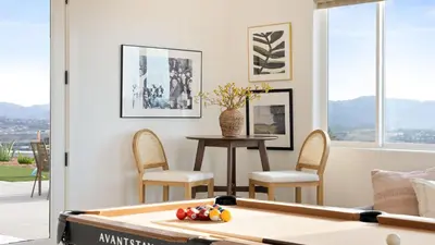 a living room with a pool table at Pinot Point by AvantStay Massive Estate 10 mins from Temecula Wineries in Temecula
