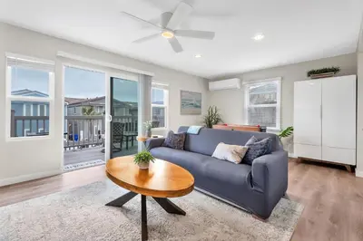 a living room with a couch and a table at Tower 9 #1 in Oceanside