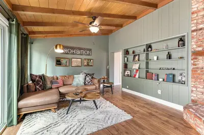 a living room with a couch and a table at Designer 4 BR La Mesa Home w/ Yard and BBQ in La Mesa