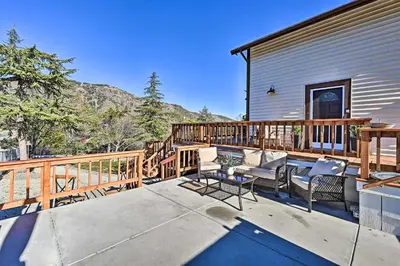 a large deck with furniture on a house at Inviting Julian Home with Scenic View and Hot Tub in Julian