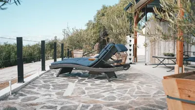 a hammock sitting on top of a patio at Hidden Hacienda in Temecula