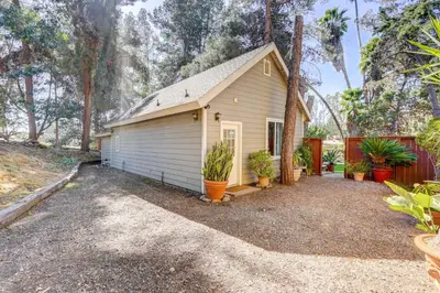 a small shed with potted plants in front of it at Fallbrook Vacation Rental 3 Mi to Wineries! in Fallbrook