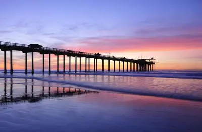 a pier on the beach with the ocean at Private Room0 Own Bath Own Entry Shared Kitchen Walk to UCSD in San Diego