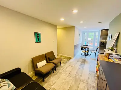 a living room with a couch and chairs and a table at Private Room2 Own Entry Shared Bath One Guest Walk to UCSD in San Diego