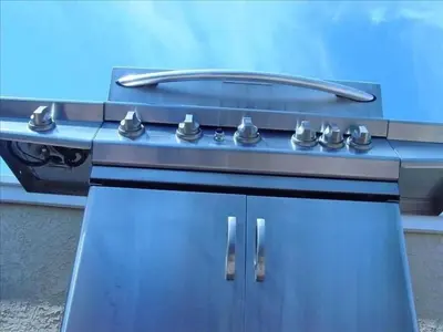 a stove top oven with a burner on top of it at the Newport Family Peninsula Beach House in Newport Beach