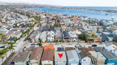 an aerial view of a town with a street at 129 Opal Ave B in Newport Beach