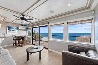 a living room with a view of the ocean at Villa Leone at the Retreat in Laguna Beach in Laguna Beach