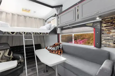 an interior of an rv with two bunk beds at Harley Davidson Ranch Glampling With Kids Play Zone in Ramona