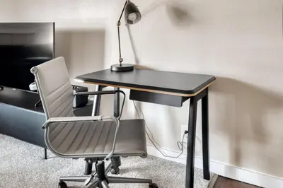 a desk with a chair and a lamp on it at La Jolla 1br w gym wd pool nr bars shops SAN-7 in San Diego